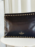 Rockstud Leather Clutch Bag