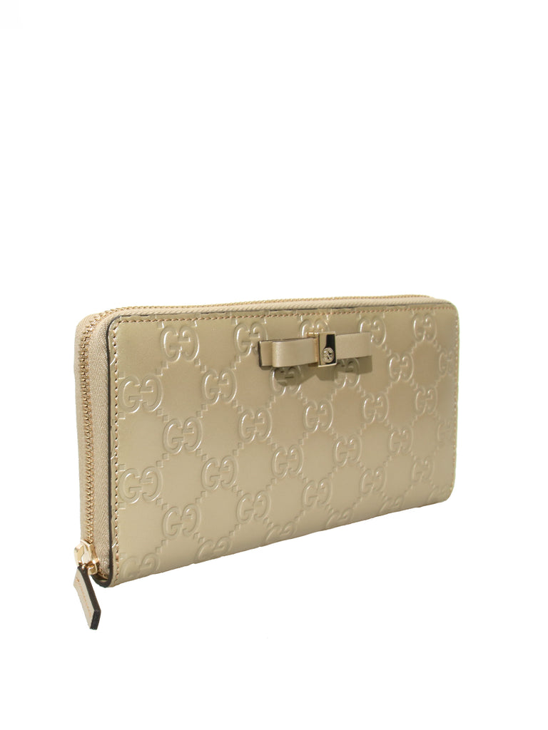 Bow Signature Zip Around Wallet