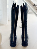 GG Embossed Leather Knee Boots