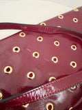 Grommet Detail Patent Leather Clutch