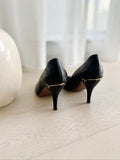 GG Embossed Leather Pumps